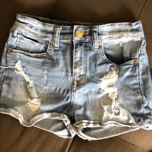 Light/medium wash distressed denim shorts